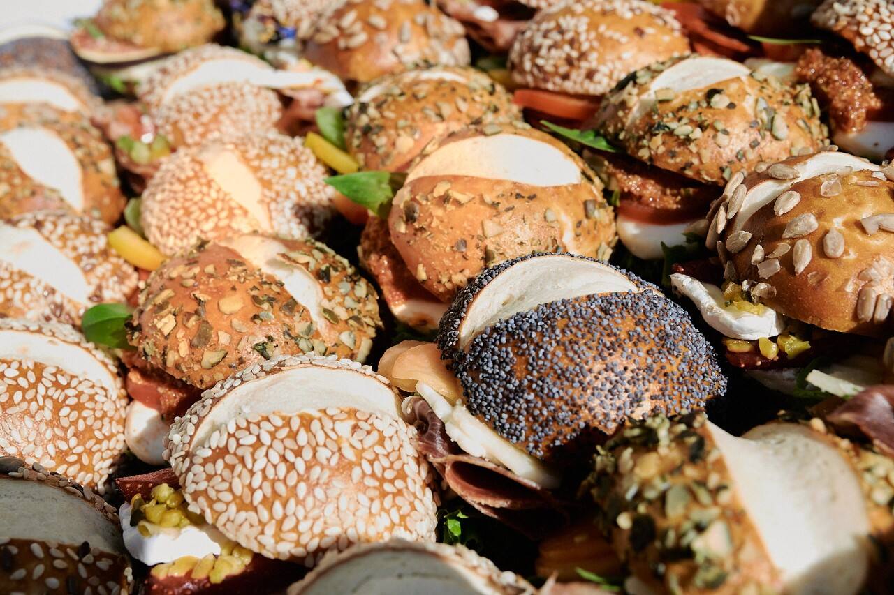 A plate of sandwiches with a variety of buns.